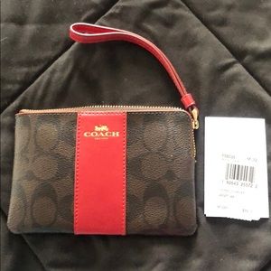 Coach wristlet with tags